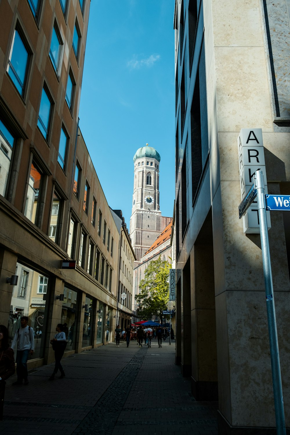 a tall clock tower towering over a city