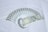 Several 500 Indian rupee banknotes arranged in a fanned pattern on a white background.