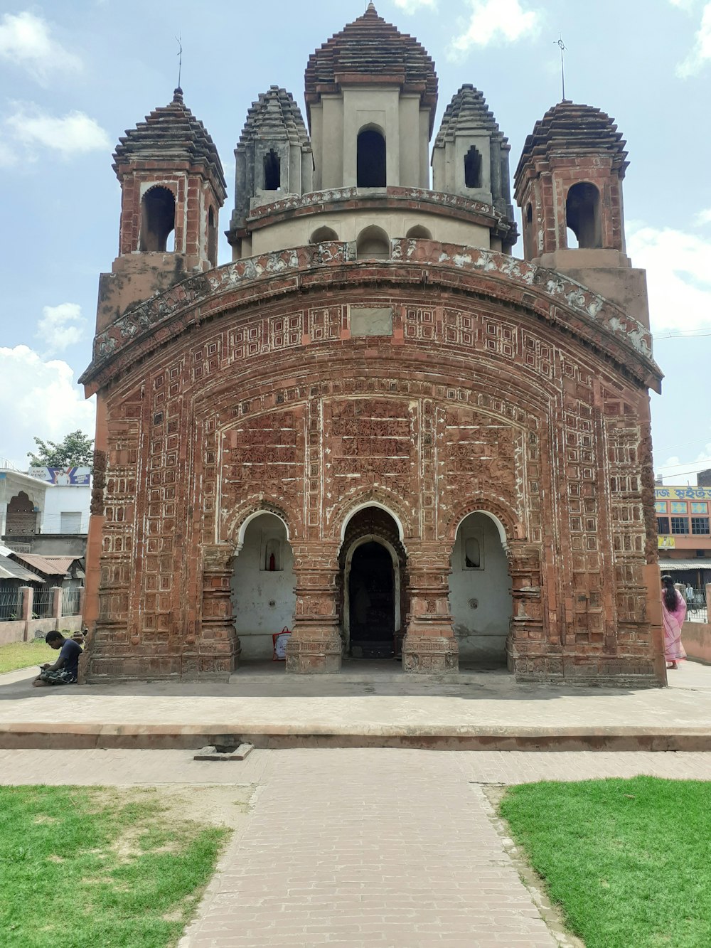 an old brick building with a clock tower