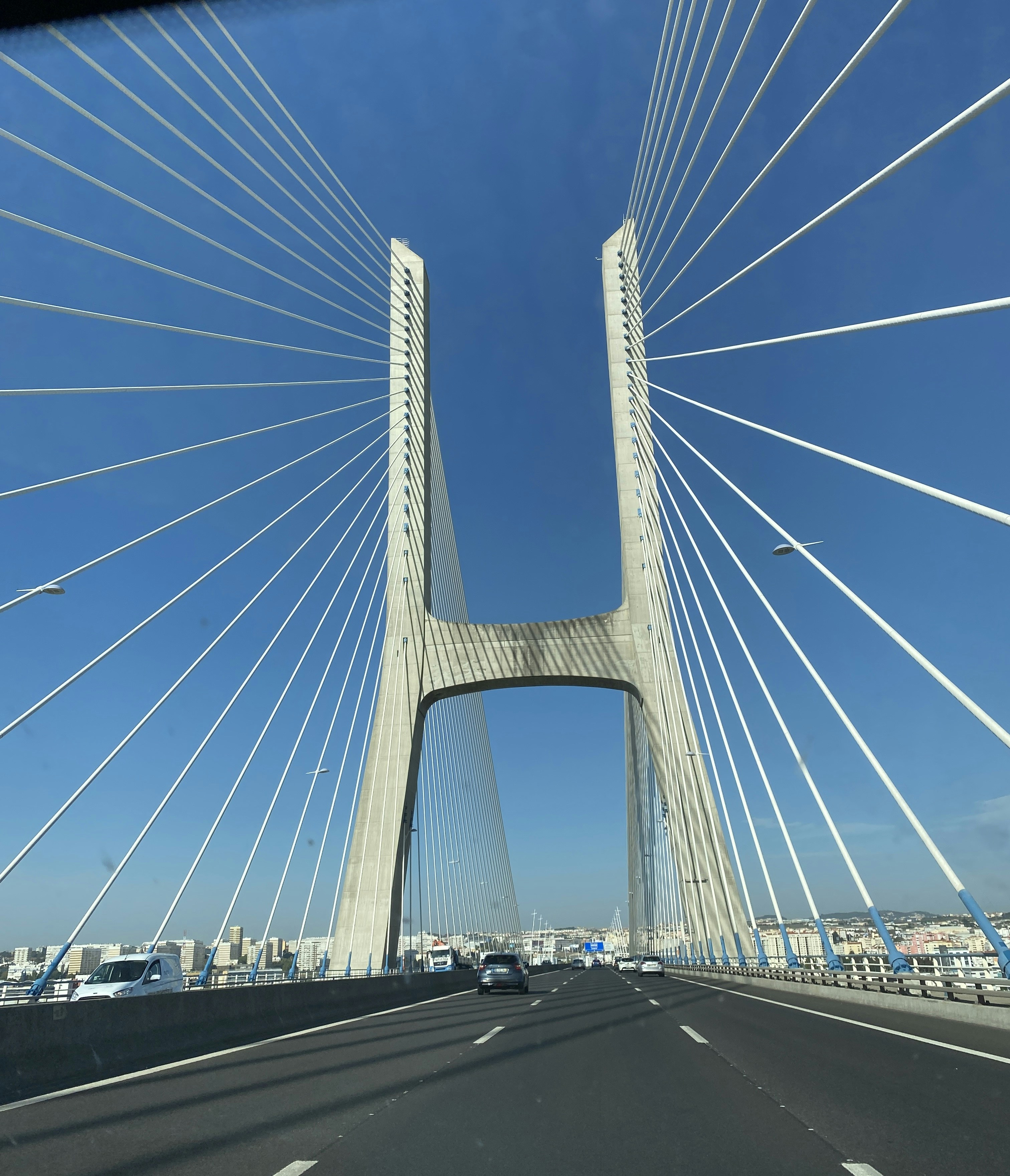 a view of a bridge from inside a car