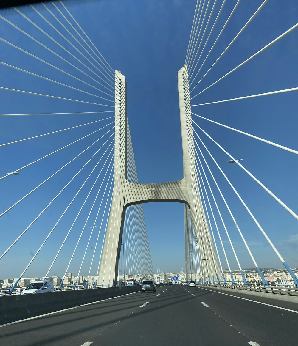 a view of a bridge from inside a car