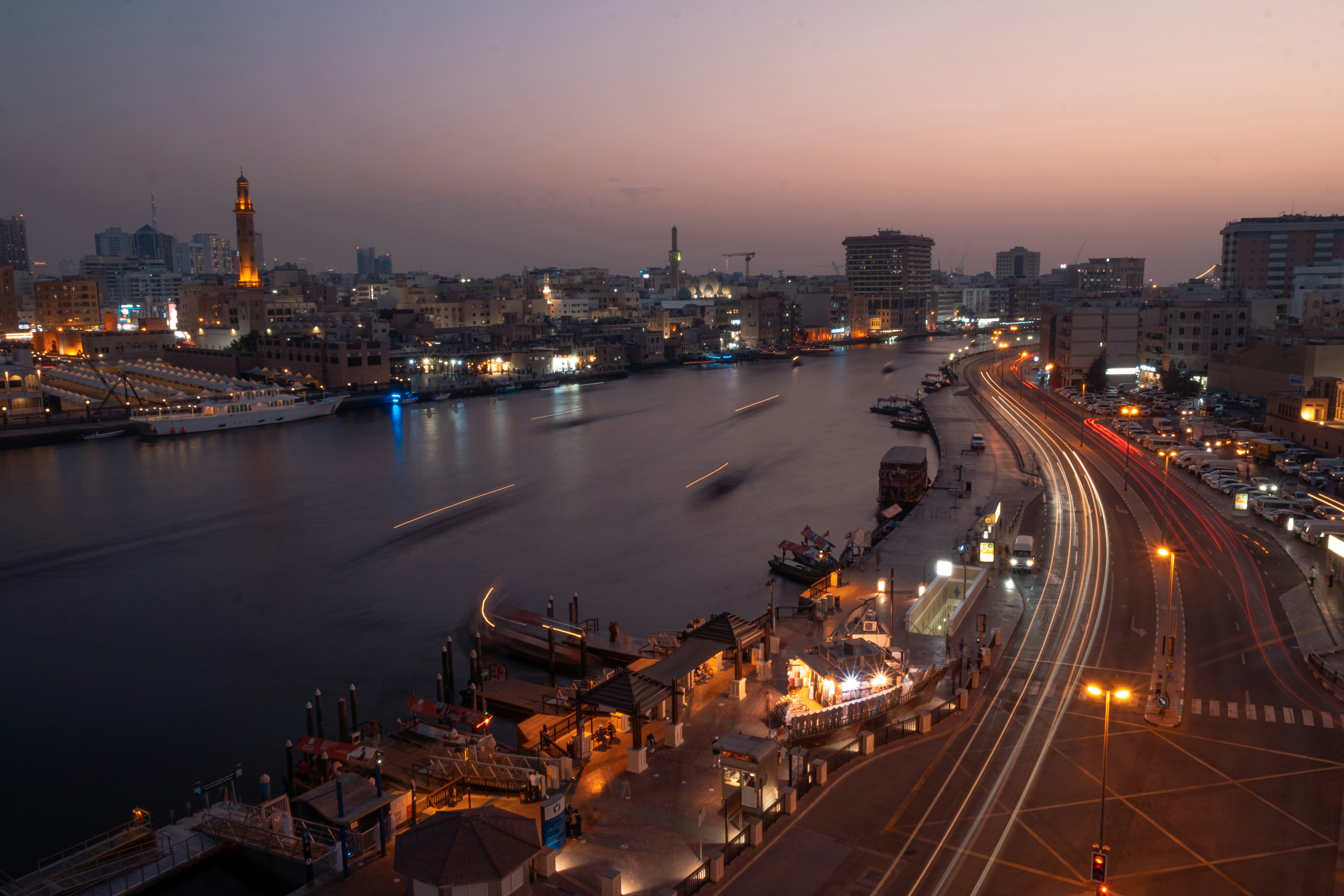 a view of a river and a city at night