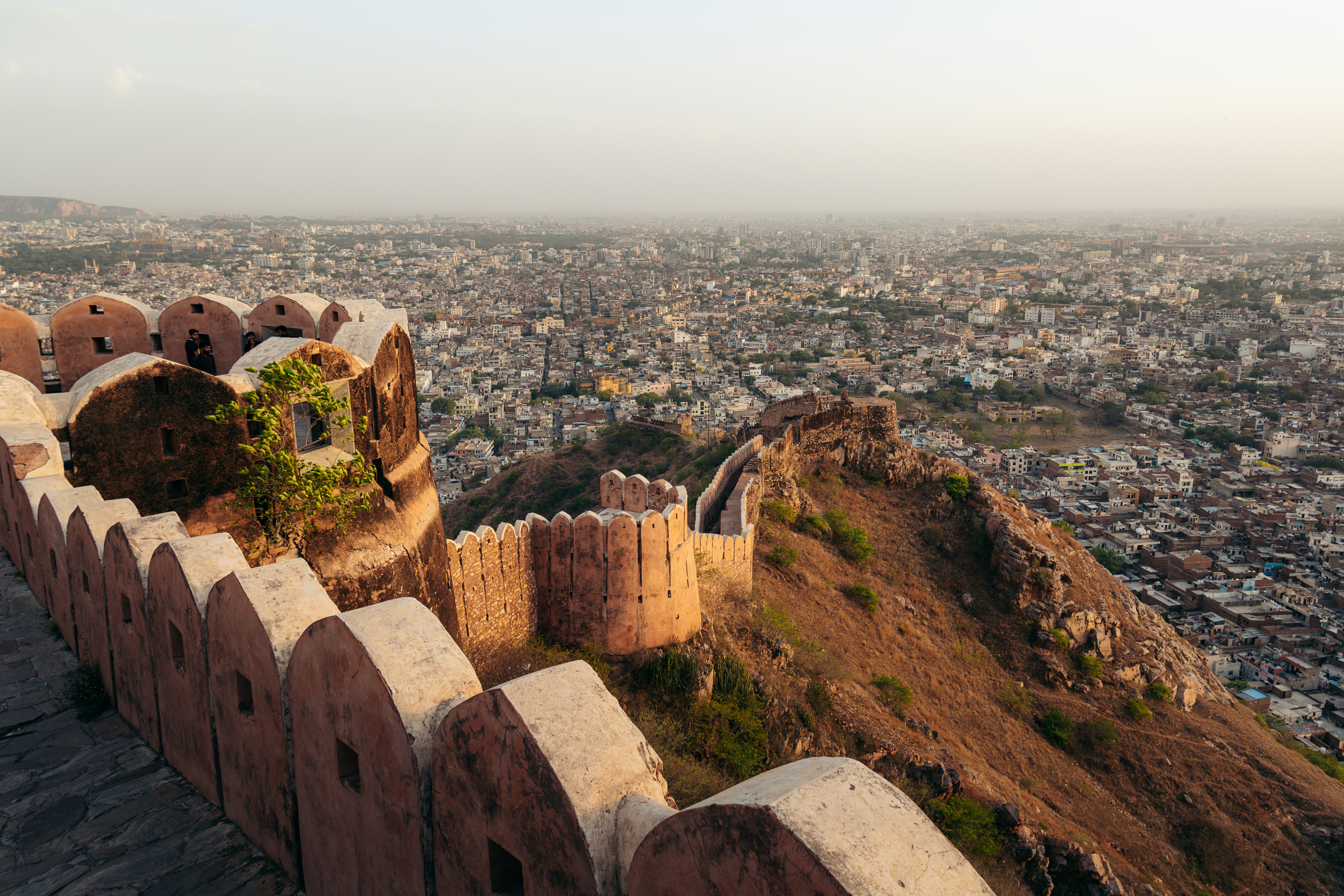a view of a city from the top of a hill