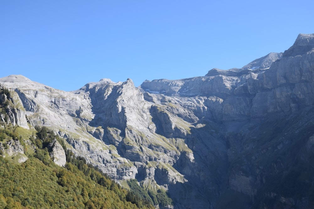 a view of a mountain range with a clear blue sky