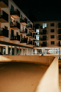 Evening view of Levante Residences showcasing the illuminated facade and serene surroundings
