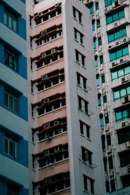 a tall building with a clock on the top of it