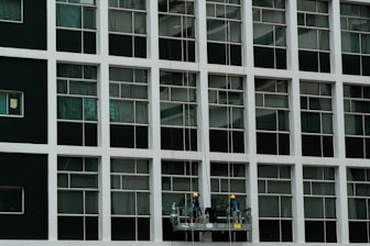 Workers cleaning up a construction site.