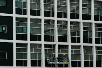 A team of cleaners working on a construction site.