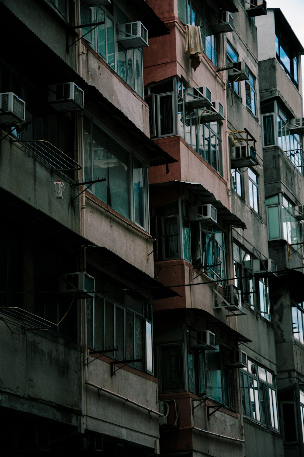 a tall building with lots of windows and balconies