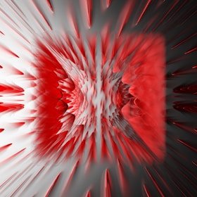 An abstract digital artwork featuring a central explosion-like pattern with jagged, radiating edges. The dominant colors are red and white, creating a dynamic and energetic composition. The design has a three-dimensional, almost sculptural feel with textures that appear sharp and layered.