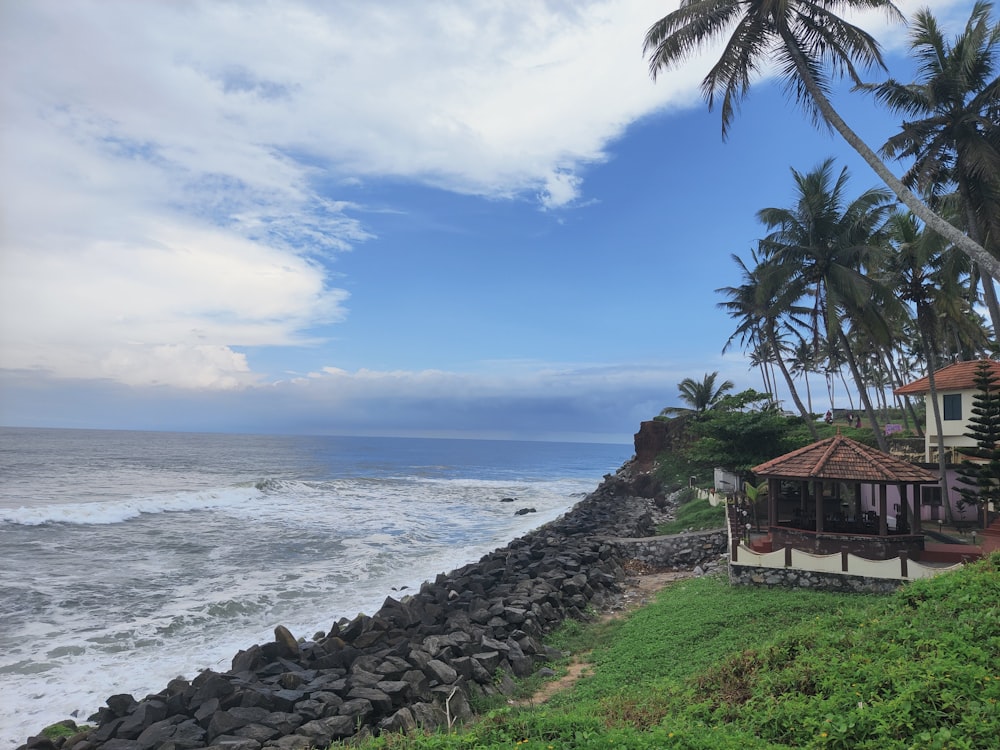 a house on the shore of the ocean