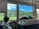 A happy customer enjoying a scenic view during a transfer.