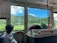 A happy customer enjoying a scenic view during their trip.
