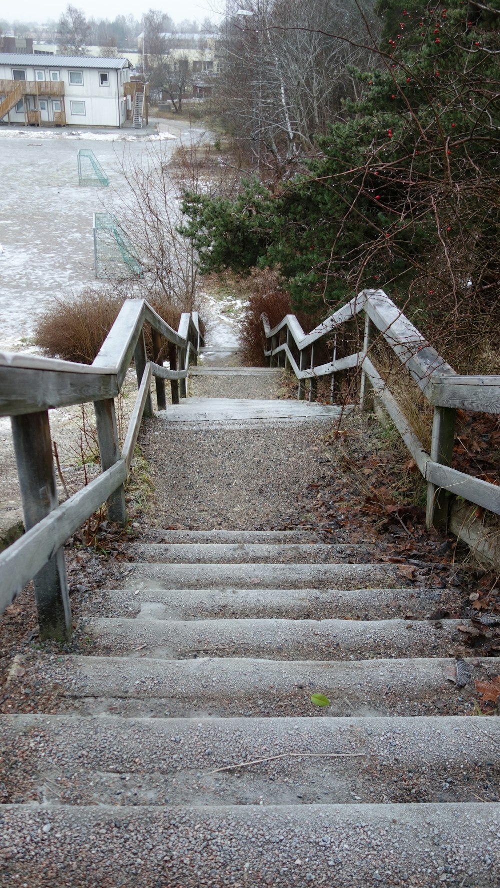 a set of stairs leading up to a body of water