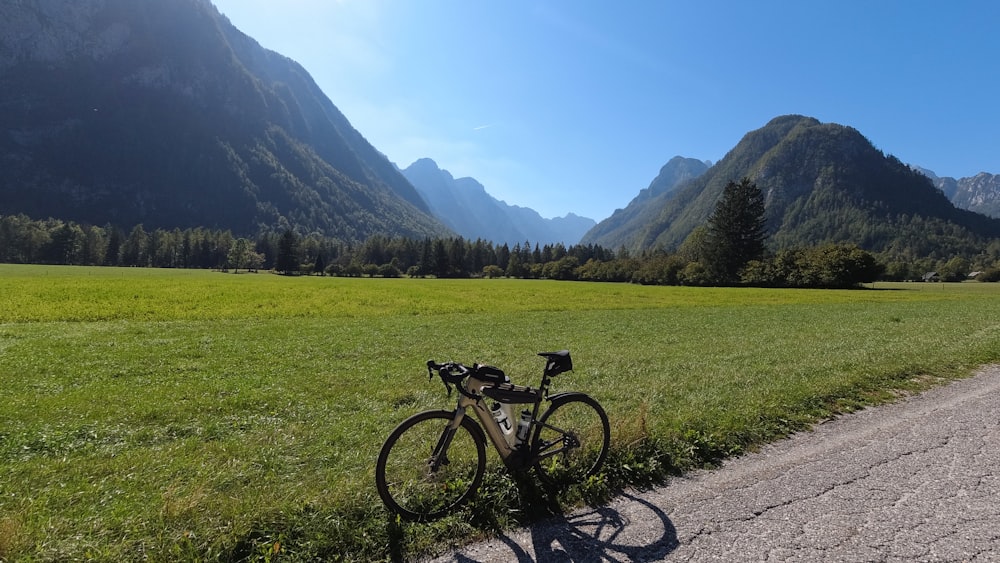 a bike parked on the side of a road