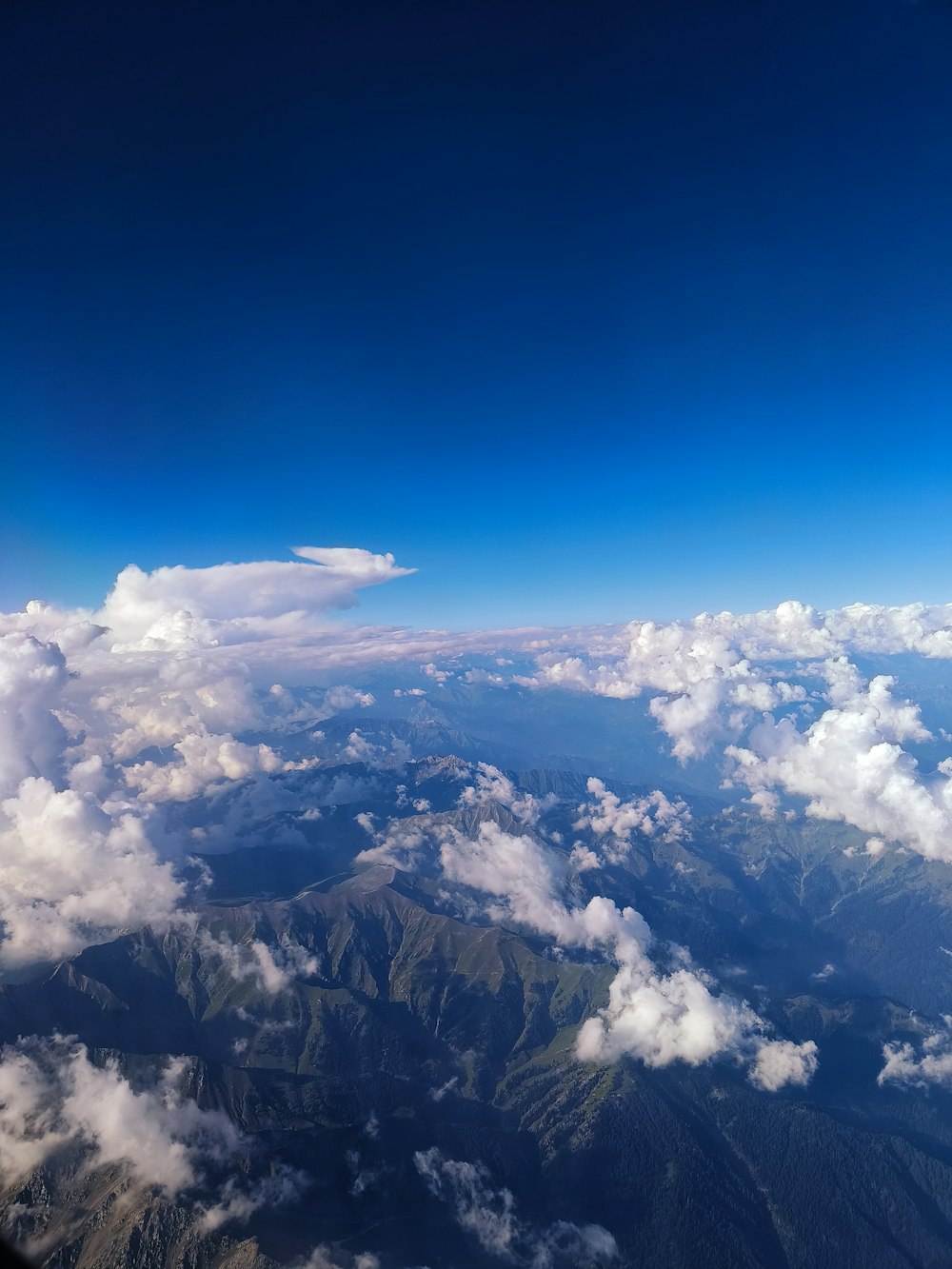 a view of a mountain range from an airplane