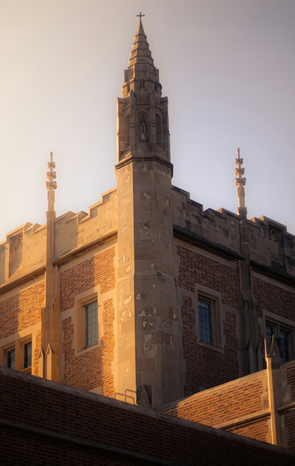 a tall brick building with a clock tower