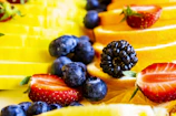 Close-up of a vibrant assortment of fresh fruits and grains symbolizing nutritious food innovation.