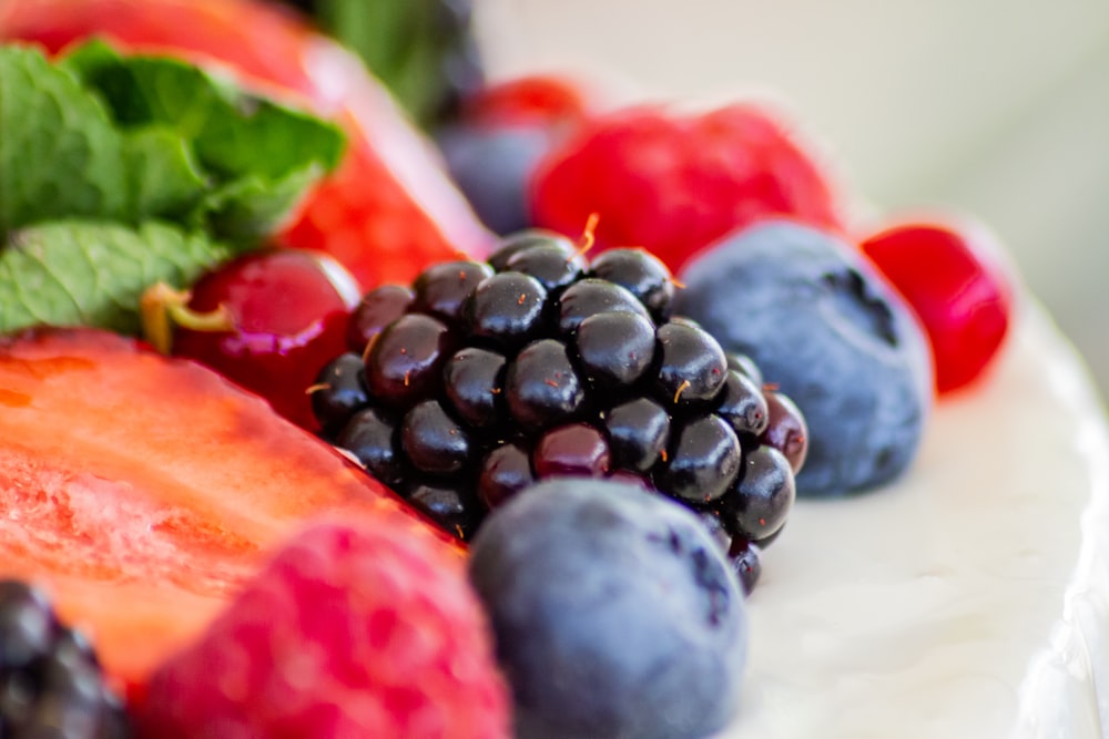 a close up of a plate of fruit on a table