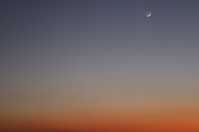 A serene cosmic landscape depicting the end of one era and the dawn of another, with zero at the center.