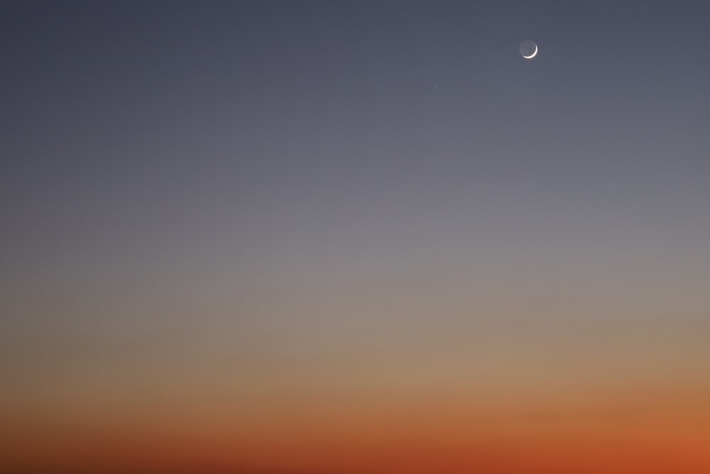 the moon and venus are seen in the sky