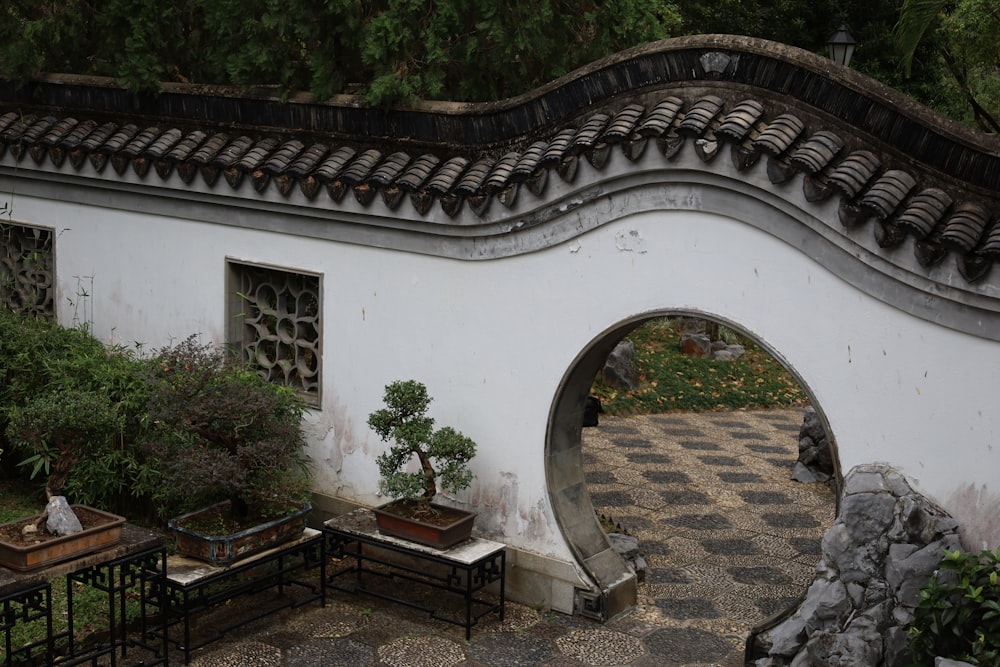 a white building with a black and white checkered floor