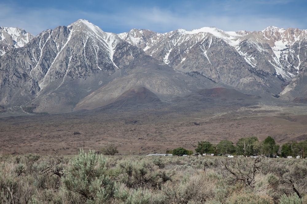 the mountains are covered in snow in the desert