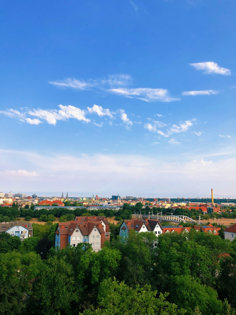 a view of a city from a hill