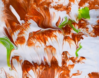 A vibrant abstract graphic print with flowing shapes in earthy tones