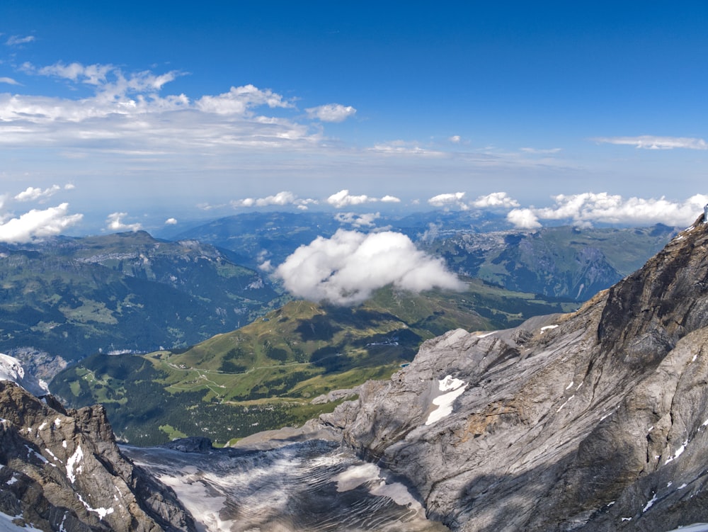 a view of a mountain range from the top of a mountain