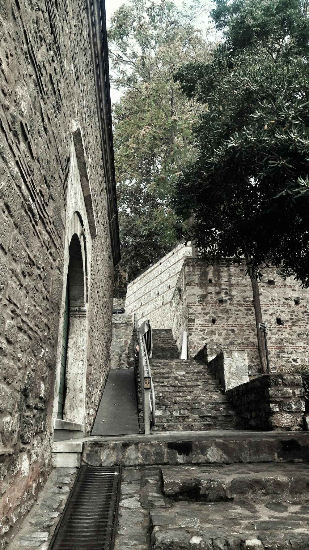 a set of stairs leading up to a stone building