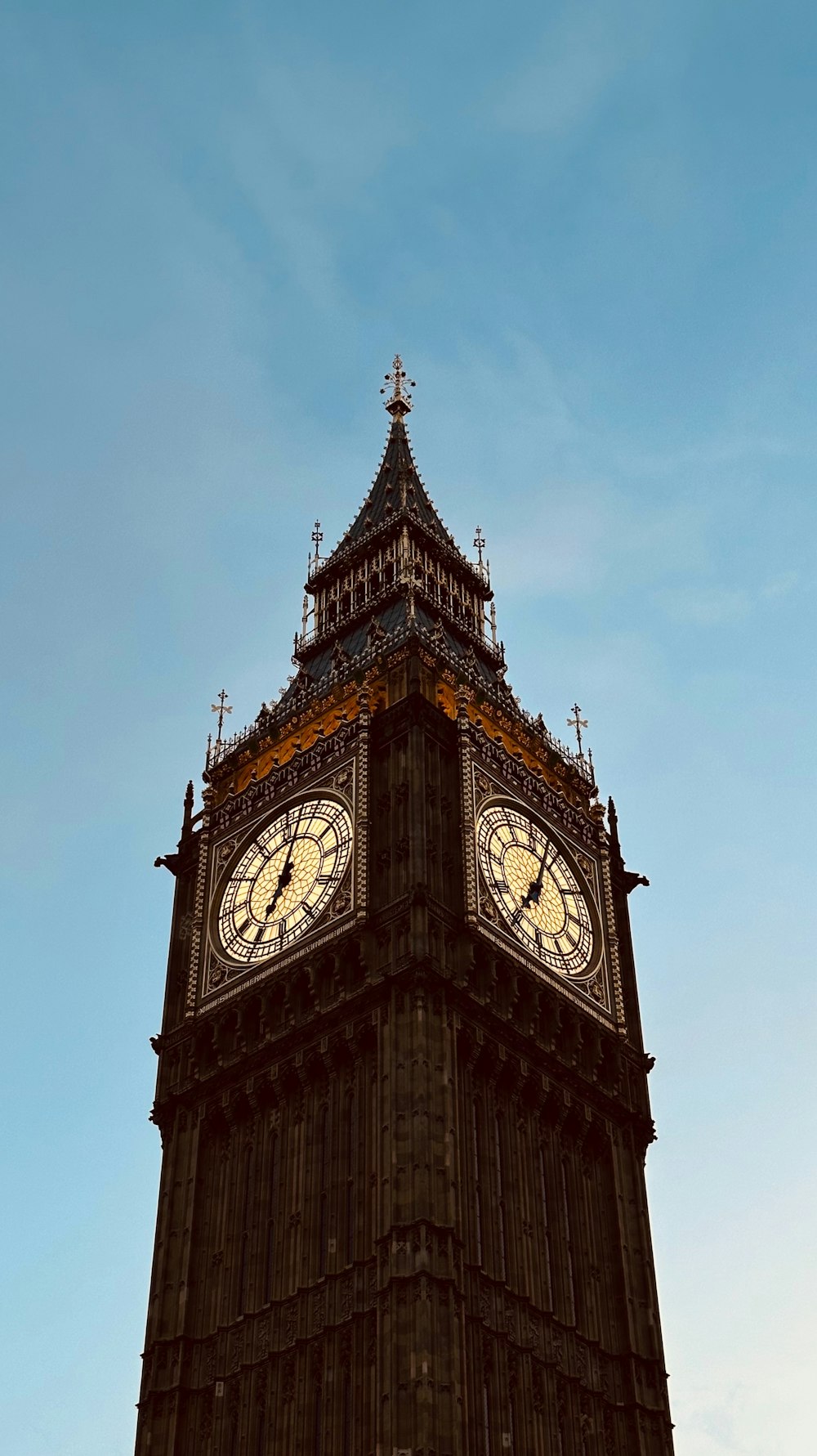 a tall clock tower with a sky background