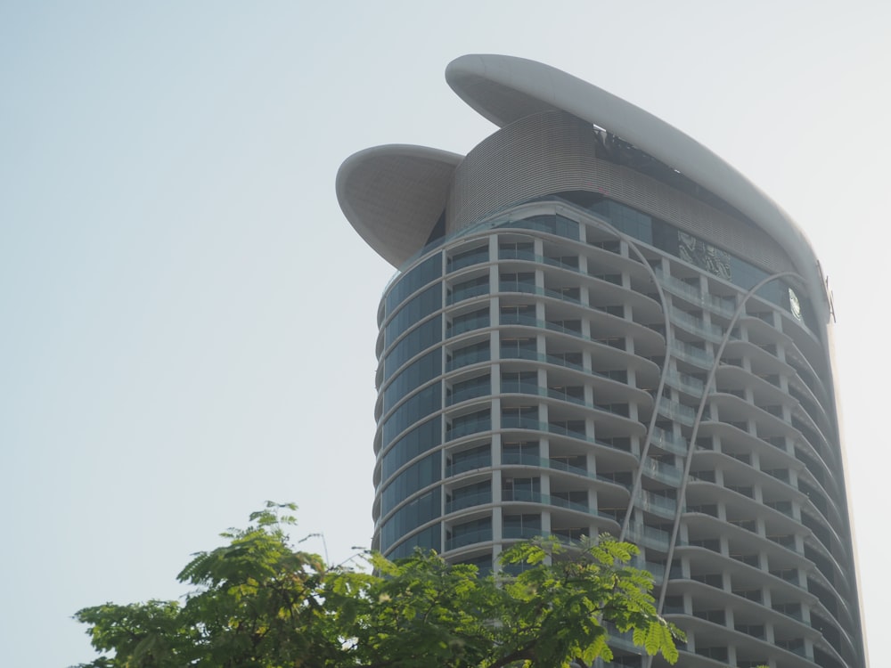 a tall building with a surfboard on top of it