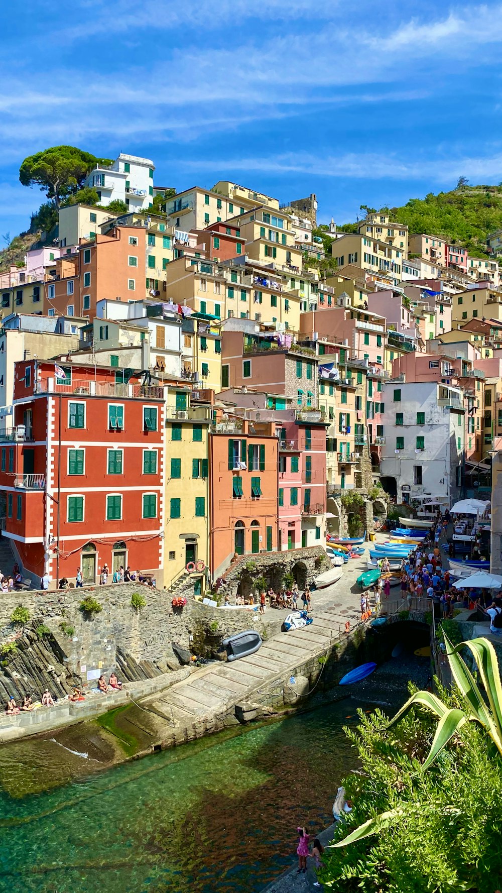 a group of buildings that are next to a river