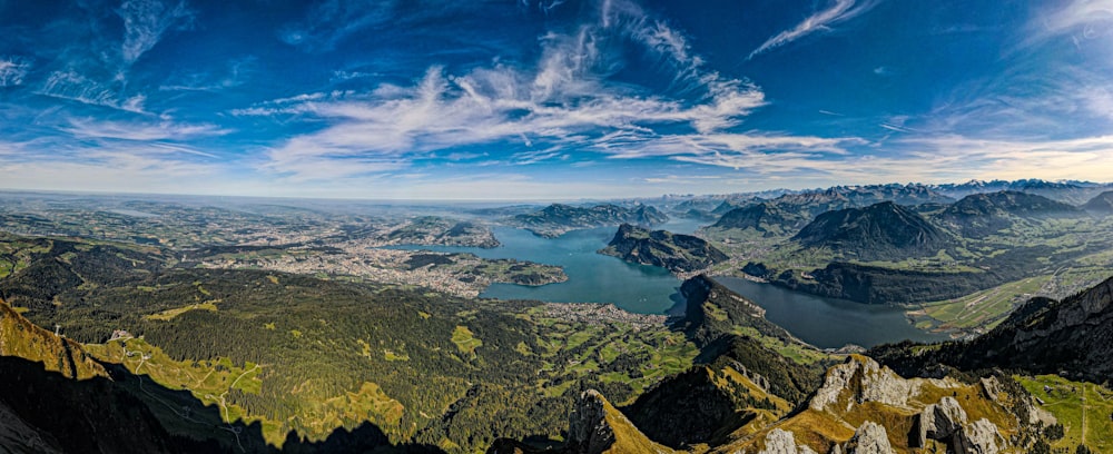 a view of a mountain range with a lake in the middle