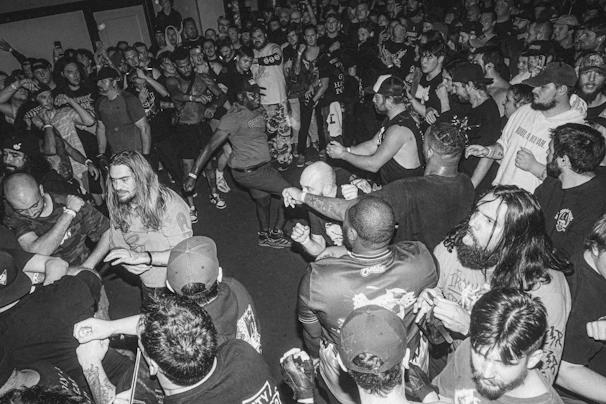 An energetic event photo with vibrant crowd and dynamic movement.