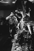 A dynamic photo of a rap artist performing on stage.