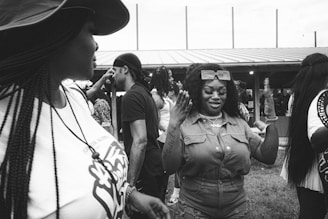 a group of women standing next to each other
