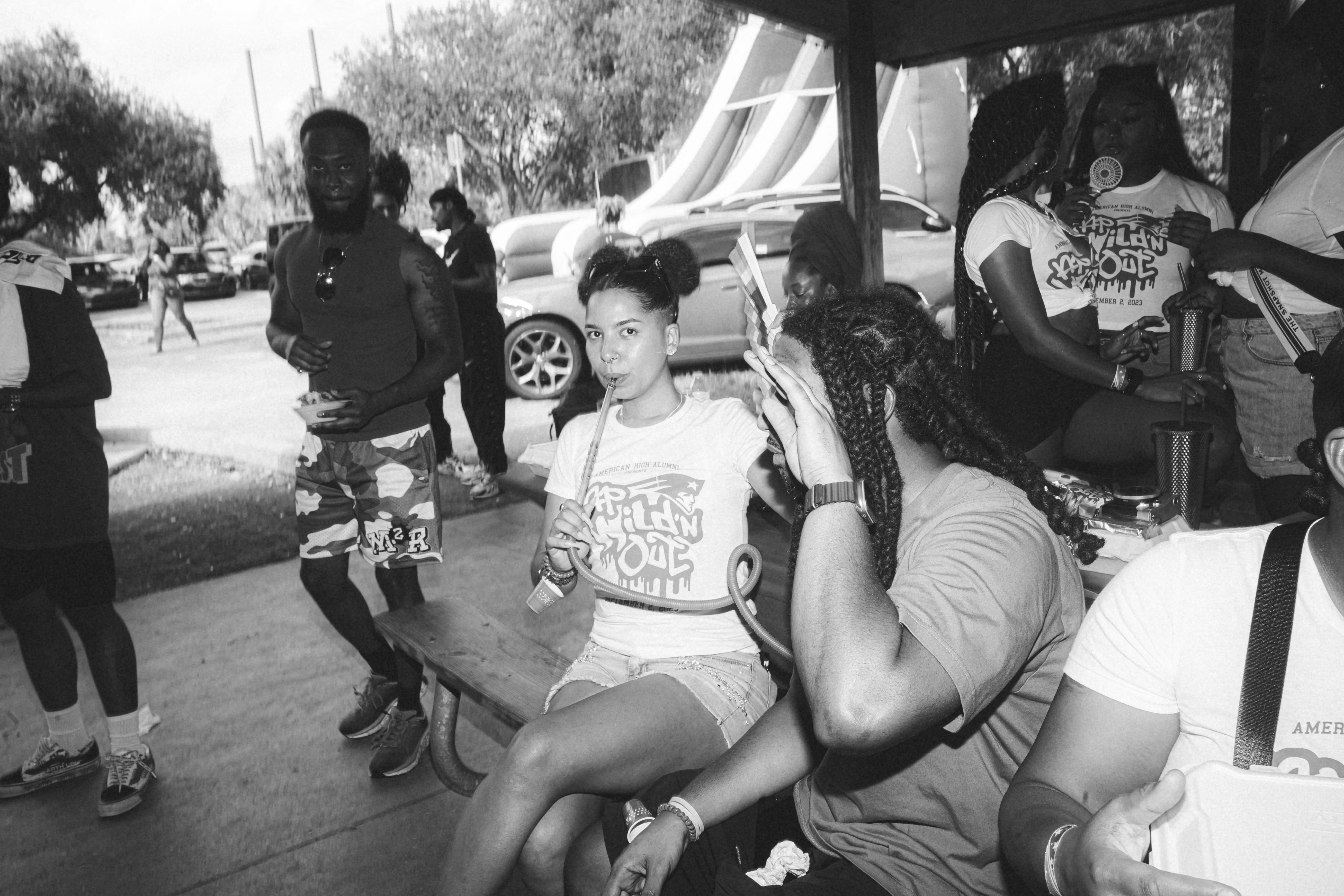 a black and white photo of a group of people