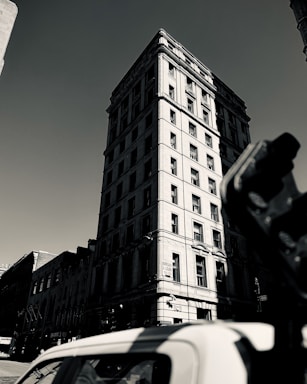 Front view of Reliant Restoration's large office building with clear signage.