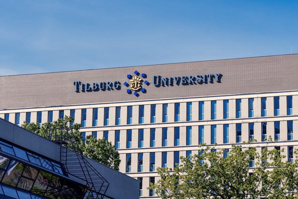 a large building with a sign on top of it