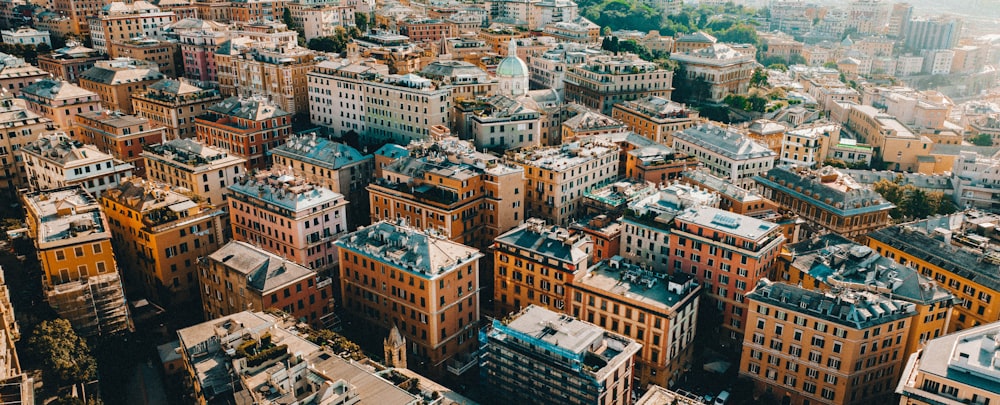 an aerial view of a city with lots of tall buildings