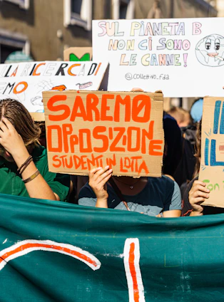 A vibrant community gathering in Livorno with banners showing support for Livorno Civica.
