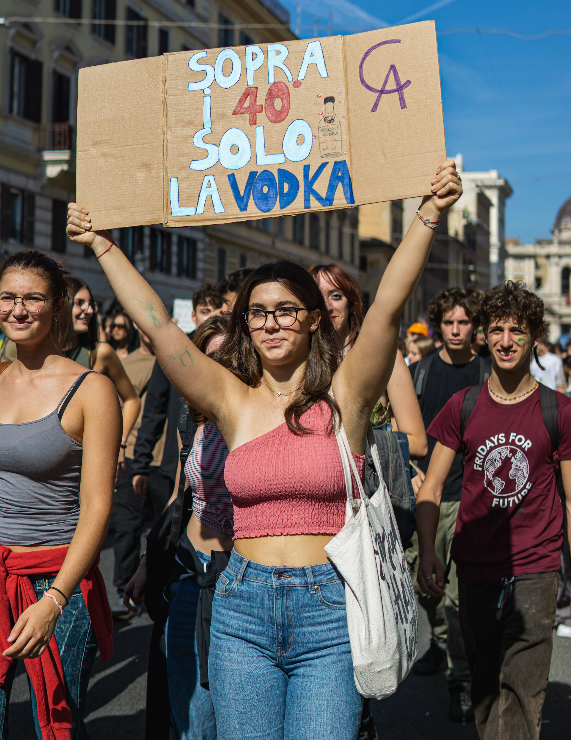 Close-up of passionate volunteers from Livorno Civica engaging with residents during a local event.