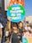 A young woman holds a colorful protest sign shaped like a globe with flames at the top, displaying the text 'THIS WORLD IS ON FIRE.' She is part of a group of people participating in a climate protest. Other participants are visible in the background, carrying signs with environmental messages. The atmosphere appears lively and engaged, with clear sunlight illuminating the scene.
