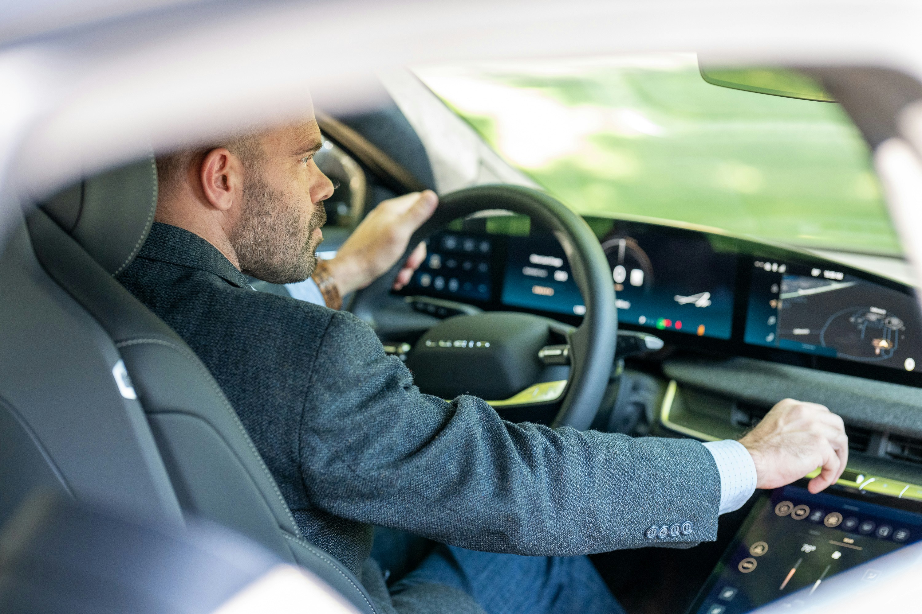 Driver interacting with an advanced AI in a futuristic car