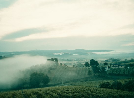 A view of a foggy valley from a hill — Orvieto, Italy