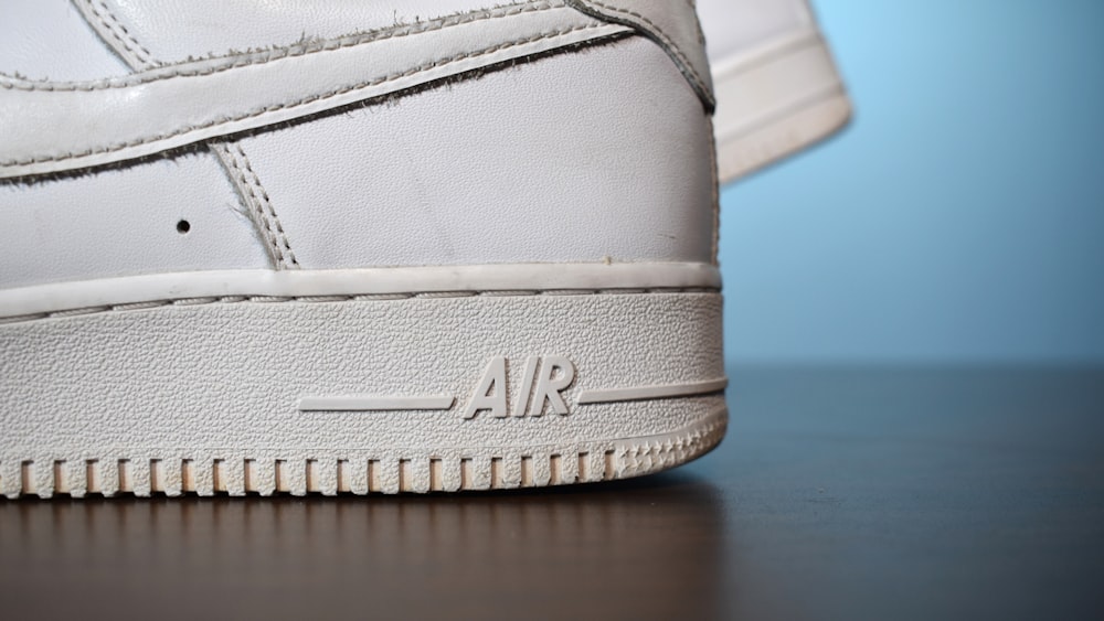 a close up of a white nike air force shoe