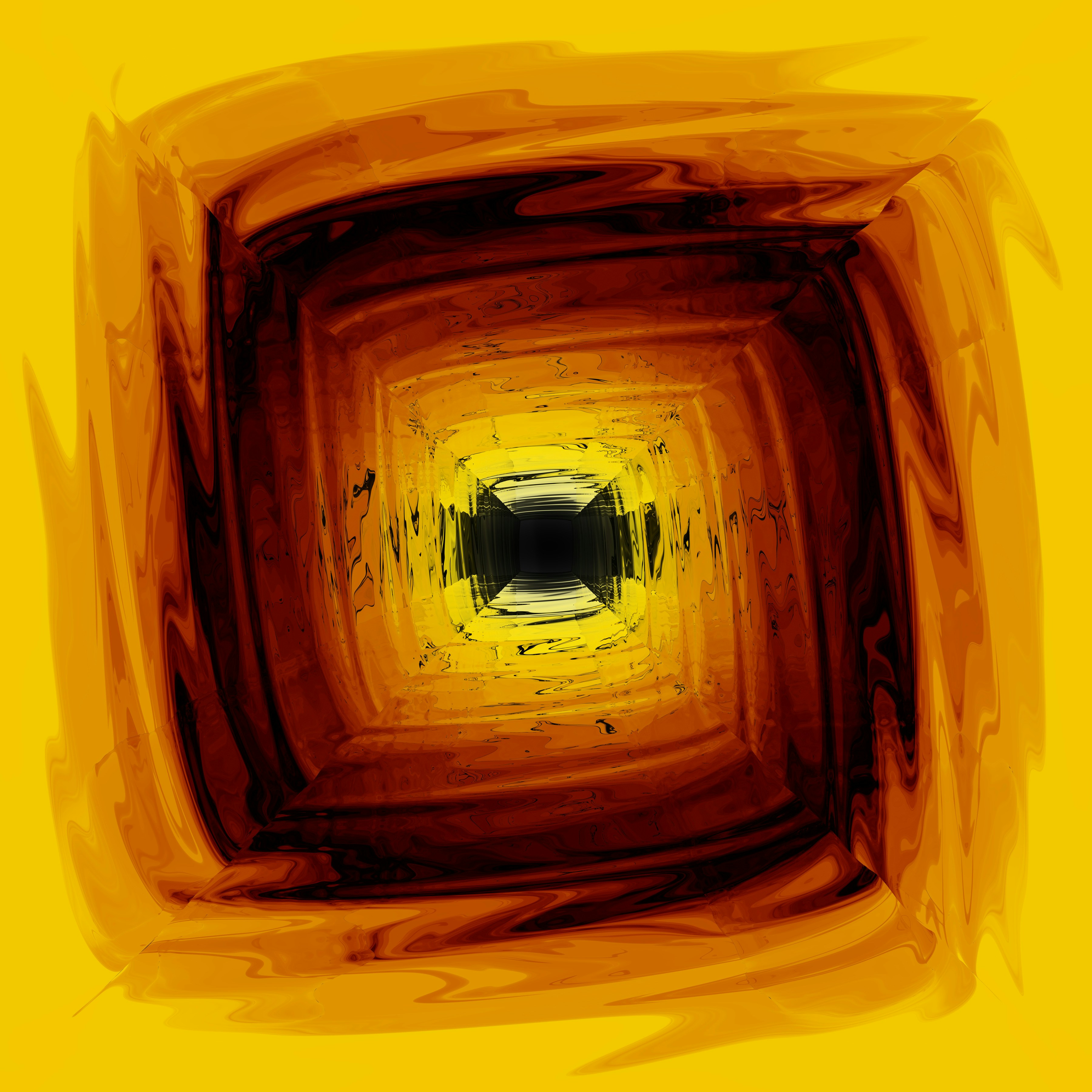 a yellow square with a black center in the center