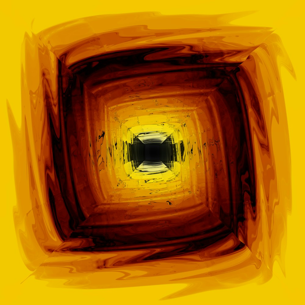 a yellow square with a black center in the center